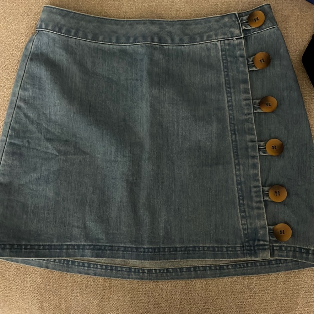 Denim button down mini skirt size 6. Worn once. Bought from boutique